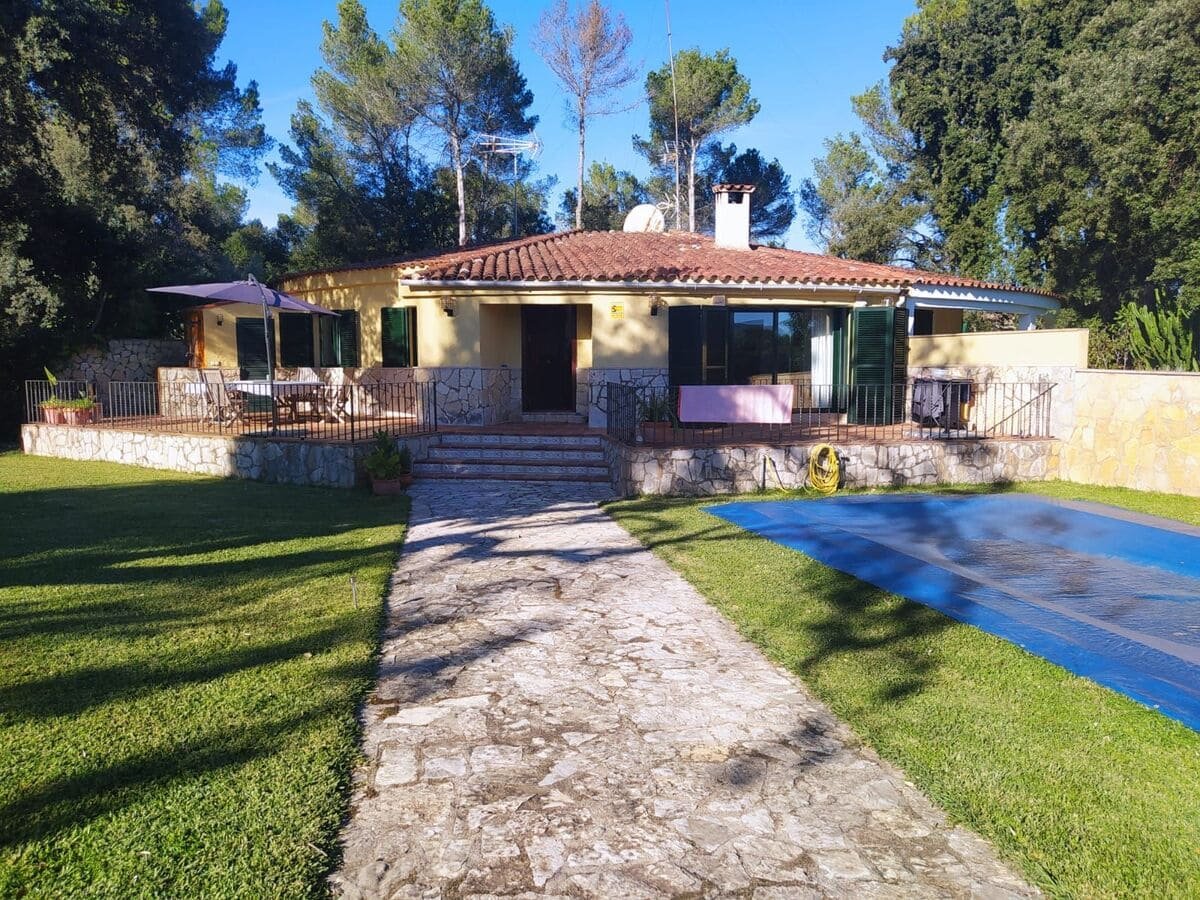 Casa adosada con jardín y piscina en Crestatx